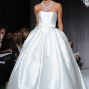 Altered white silk wedding dress with detailed train and pockets in size